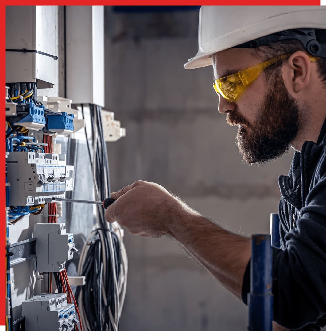 A commercial electrical contractor working on an electrical system in Jacksonville, FL